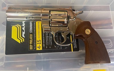 Colt Python (4 inch, nickel, near mint)