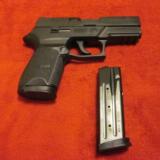 Sig Sauer 9mm- 1 of 12