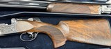 Beretta DT11 L 12ga 32” Barrel. 99% Overall Condition. Unfired.This is the the L “Luxury” or Lusso DT11 Left Handed Palm Swell - 3 of 10
