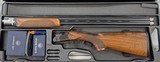 Beretta 690 Sporting 12ga 32” Barrel. Comes with case, 5 chokes, and other accessories pictured. This is a Y-1 factory demo gun - 1 of 5