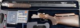 Beretta DT11 ACS 12ga 32” Barrel. Factory Demo (see photos for details). Comes as pictured at % condition, minor handling marks, in original fac