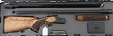 Charles Daly 202 Unsingle/Over Under Combo 12ga 30” Barrels. Adjustable Comb. New in box. 6 Chokes - 1 of 4