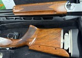 SKB 95ASR 12ga 32” Barrel Adjustable Rib and Stock Right Hand. Length of Pull 13”-15.25”, Drop at Heel 1.75”, Drop at Comb 1.75”, Chokes: F,IM,M - 3 of 4