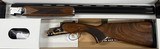 SKB 720 Field Special Edition Case Colored 20ga 28” Barrel. Length of Pull 14.5”, Drop at Heel 1.5”, Drop at Comb 2.25”, Chokes: F,IM,M,IC,SK. - 1 of 4