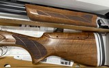 SKB 90TSS Sporting 12ga 30” Barrel Adjustable Stock Left Hand. Length of Pull 14”-15.25”, Drop at Heel 2 3/8”, Drop at Comb 1 5/8”, Chokes: M,LM - 2 of 4