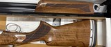 SKB 90TSS Sporting 12ga 30” Barrel Adjustable Stock Left Hand. Length of Pull 14”-15.25”, Drop at Heel 2 3/8”, Drop at Comb 1 5/8”, Chokes: M,LM - 3 of 4