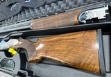 Rizzini BR110 Sporter 12ga 32” Barrel 3” Chamber. Adjustable Stock. Comes in hard case with 5 extended chokes. Right hand cast and palm swell. - 2 of 4