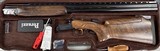 Perazzi MX8 Trap 12ga 32” Barrel Fixed Choke M/F. Tapered Low Stepped Rib. MX2000 Wood. Adjustable Montecarlo Stock. #22459