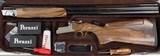 Perazzi MX8 12ga 32” Barrel. 7 flush screw chokes, adjustable comb, Montecarlo stock, SC2 wood upgrade. #22574 - 1 of 7