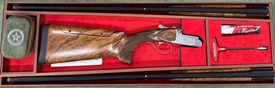 Yildiz Pro Star Scroll Engraved Sporting Combo 20/28ga 32” Barrel. New in case with 5 chokes for each gauge.