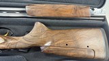 Perazzi MX2000 S 12ga 32” Barrel Adjustable Comb. Glossy polished frame, pierced top lever, SC2 wood upgrade. New in case. - 4 of 6 Perazzi MX2000 S 12ga 32” Barrel Adjustable Comb. Glossy polished frame, pierced top lever, SC2 wood upgrade. New in case. - 4 of 6