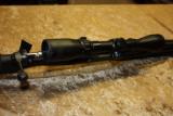 Savage 270; Model 111, bolt action, 22 inch barrel, black synthetic stock. Comes with Bushnell 3x-9x40 scope and 9 cartridge stock sleeve.
- 5 of 6