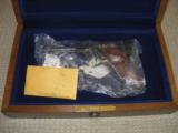Colt Huntsman 1 of 400 gold
S Model NIB with presentation case and factory box. - 3 of 7
