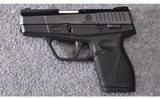 Taurus ~ Model 709 Slim ~ 9MM - 2 of 2