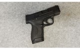 Smith & Wesson ~ M & P ~ 9 ~ Shield ~ 9 mm. - 1 of 2