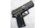 SIG Sauer ~ SP2022 ~ .40 S&W. - 1 of 2