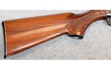 Remington ~ 1100 ~ 12 Gauge. - 2 of 11