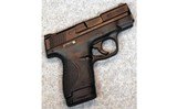 Smith & Wesson ~ M&P9 Shield ~ 9 mm Luger. - 1 of 2