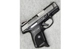 Ruger ~ SR9C ~ 9 mm Luger. - 1 of 2