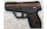 Taurus ~ PT 709 Slim ~ 9 mm Luger. - 2 of 2