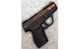 Taurus ~ PT 709 Slim ~ 9 mm Luger. - 1 of 2