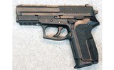 SIG Sauer ~ P2022 ~ .40 S&W. - 2 of 2