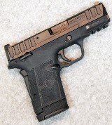 Smith & Wesson ~ Equalizer ~ 9 mm Luger. - 1 of 2