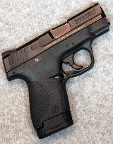 Smith & Wesson ~ M&P9 Shield ~ 9 mm Luger.