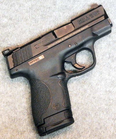 Smith & Wesson ~ M&P9 Shield ~ 9 mm Luger.