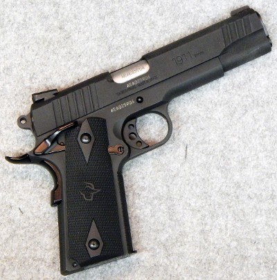 Taurus ~ 1911 ~ 9 mm Luger.