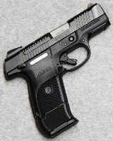Ruger ~ SR9C ~ 9 mm Luger. - 1 of 2