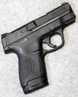 Smith & Wesson ~ M&P9 Shield ~ 9 mm Luger. - 1 of 2