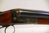 Sauer SxS 12 ga boxlock shotgun. Great C&R gun.
- 5 of 8