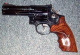 Smith & Wesson 586-3
ENGRAVED - 7 of 7