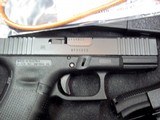 Glock 19 Gen 4 with Night Sights and Front serrations.
9MM - 2 of 2
