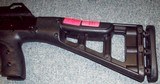 High Point 995 Carbine with forward folding grip. - 2 of 3