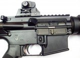 Bushmasrer M4 with ADJUSTABLE sights. - 3 of 5