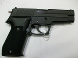 Sig Sauer P220
.45 ACP. - 2 of 3