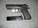 Magnum Research Baby Eagle 9mm. - 2 of 2