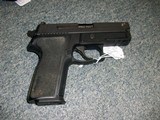 Sig Sauer P229
9mm. - 2 of 2
