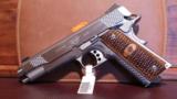 Kimber	Stainless Raptor II	.45acp- 1 of 4