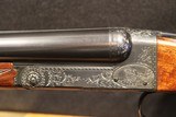 CSM
Winchester Model 21 12 Gauge No. 5 Engraving - 1 of 5