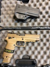 As new Sig Sauer P320-M17 9mm with case and holster