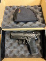 As new Sig Sauer P229 9mm with box - 1 of 2