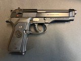As new Beretta M9 in 9mm caliber with original box and accessories - 1 of 3