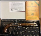 As new Pedersoli Kentucky Flintlock pistol in .50 cal New w/ box