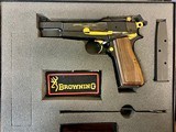 Browning D-Day Commemorative High Power Semi-Automatic Pistol with original case, pouch, paperwork- As new and unfired!