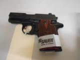 SIG SAUER P938 9MM ROSEWOOD
- 1 of 2