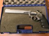 Smith & Wesson Model 647, 17 HMR 8 3/8" SS - 1 of 8