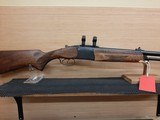 BAIKAL COMBINATION O/U 12 GAUGE OVER .308 WIN - 1 of 14